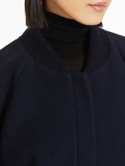 Cape-effect cashmere coat