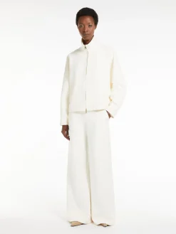 Flared technical jersey trousers