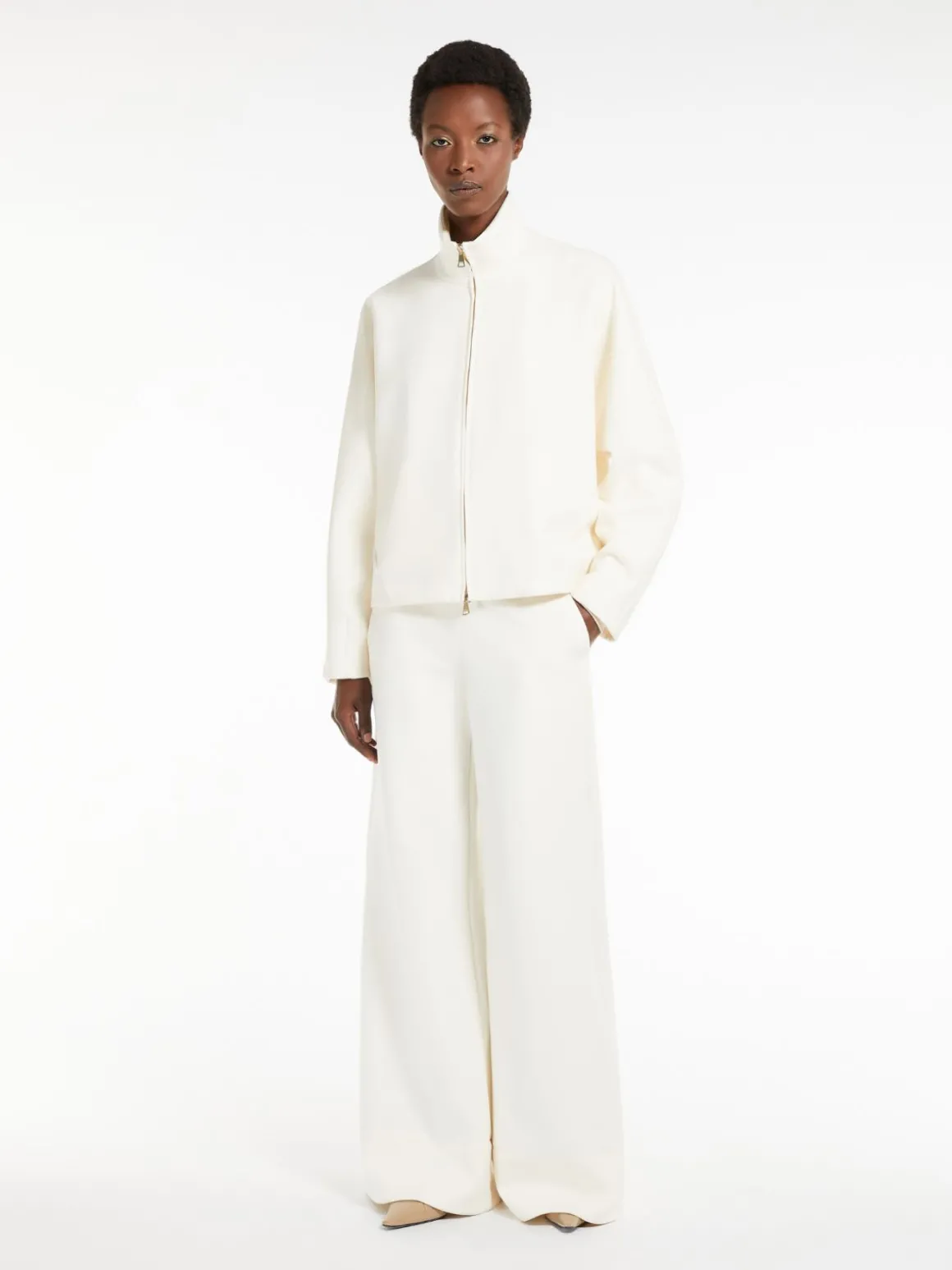Flared technical jersey trousers