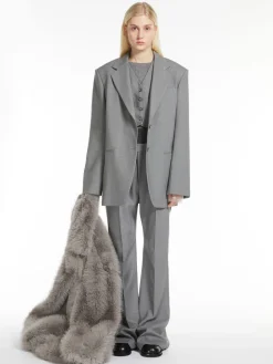 Flared trousers with a branded double belt
