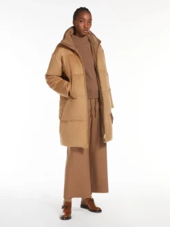 Long, reversible camel colour down jacket