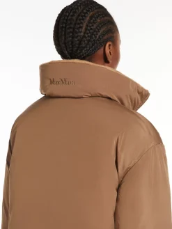Long, reversible camel colour down jacket