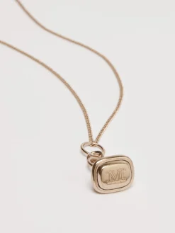 Long stamp-pendant necklace