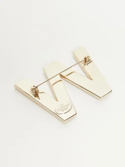 Metal brooch with rhinestones