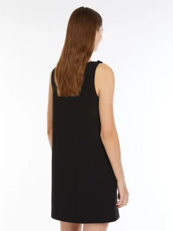 Short dress in embroidered sablé