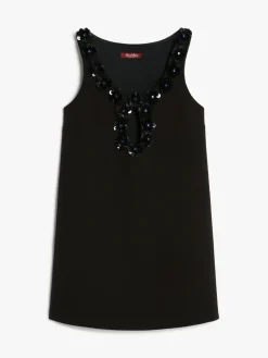 Short dress in embroidered sablé