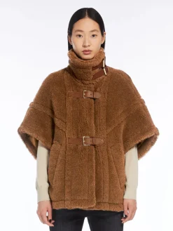 Teddy fabric cape with straps