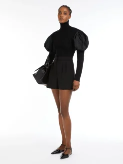 Wool jumper with taffeta sleeves